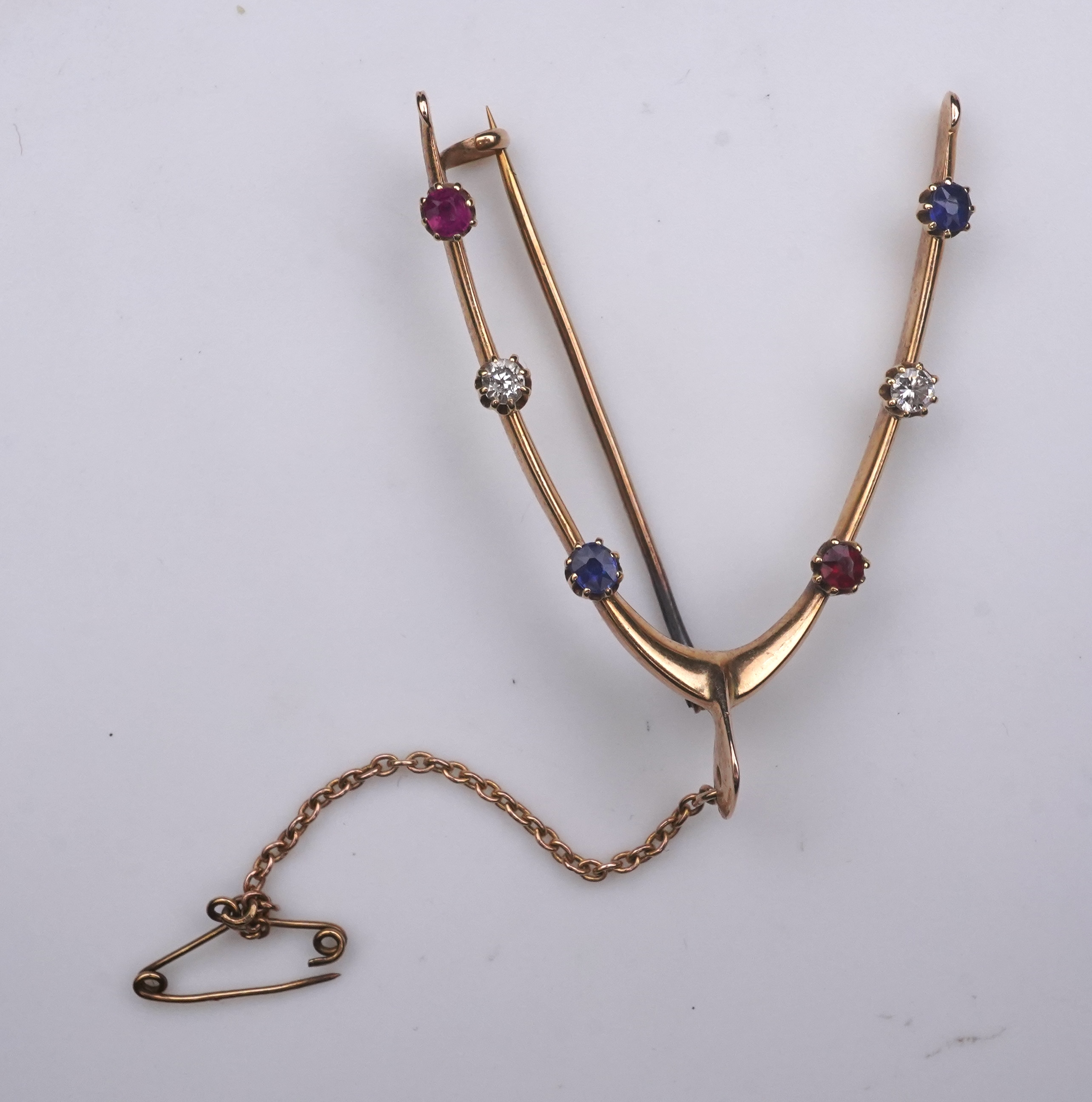 An Edwardian ruby, sapphire and diamond brooch, early 20th century